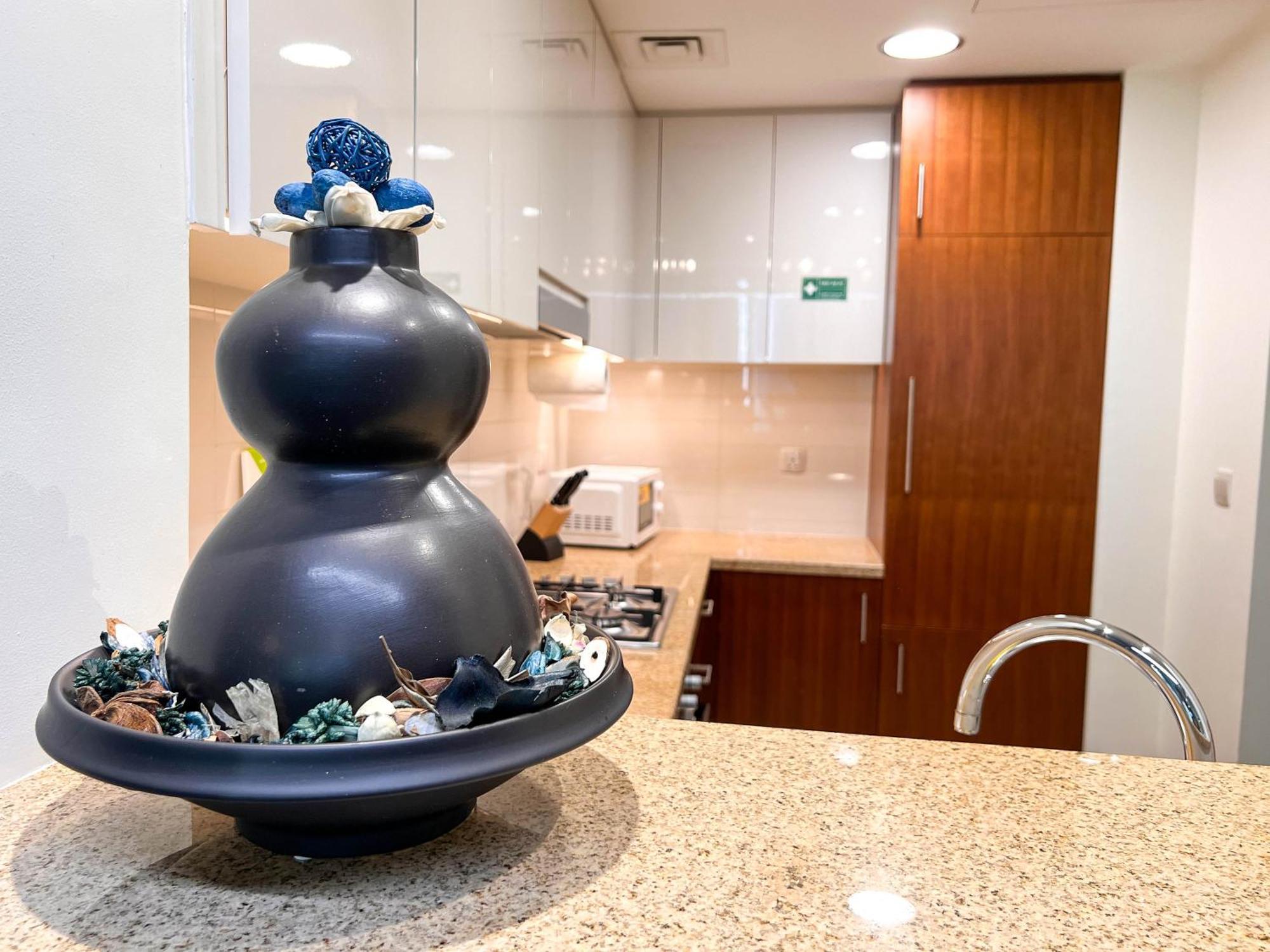 Appartamento Cosmos Living Downtown Dubai Esterno foto